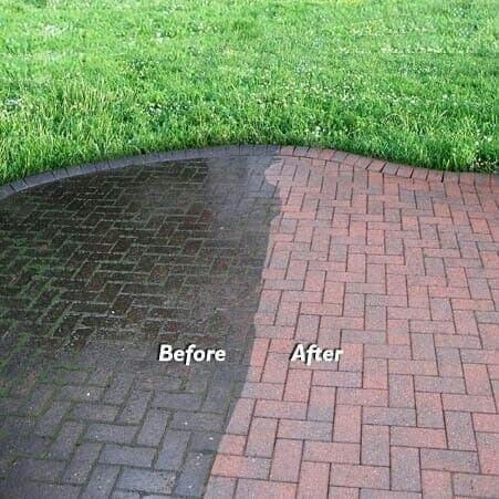 Dark stained brick pavers before pressure washing and clean red pavers after